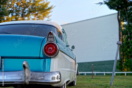 Classic Car at Drive-In Movie Theater