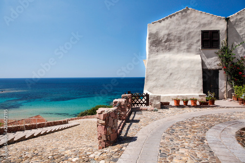 Fototapeta Naklejka Na Ścianę i Meble -  Villaggio pescatori di Porto Paglia - Gonnesa - con vista sul mare smeraldo