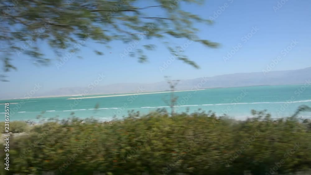 Curvy road with a view on Dead Sea at the end of a Summer day in Negev Desert Curvy road with a view on Dead Sea at the end of a Summer day in Negev Desert