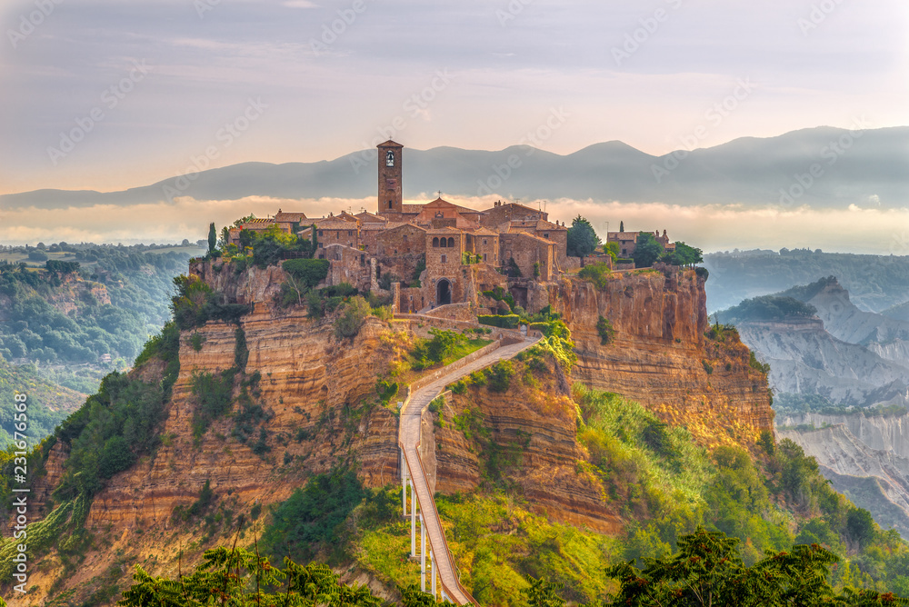 Morning view at the old stone town Civita di Bagnoregio in Italy - obrazy, fototapety, plakaty 