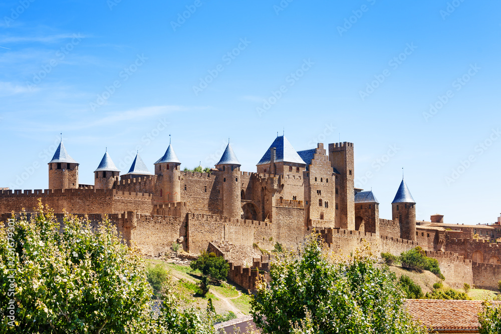 Fortified city of Carcassonne against blue sky