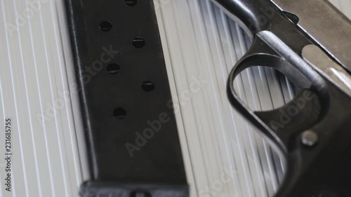 Gun On Metal Background