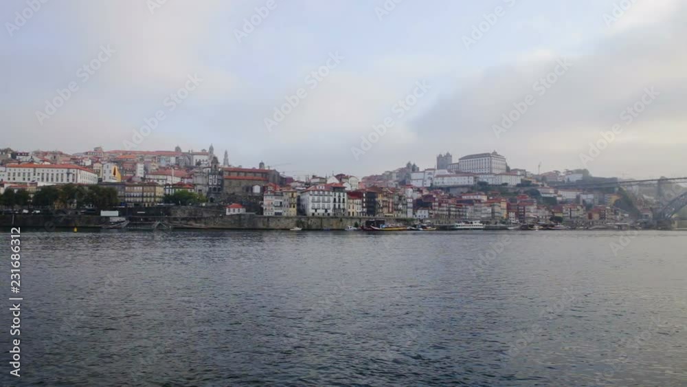 Architecture and historical buildings of the Portuguese city of Porto. View from the river Douro. Architecture and historical buildings of the Portuguese city of Porto. View from the river Douro.
