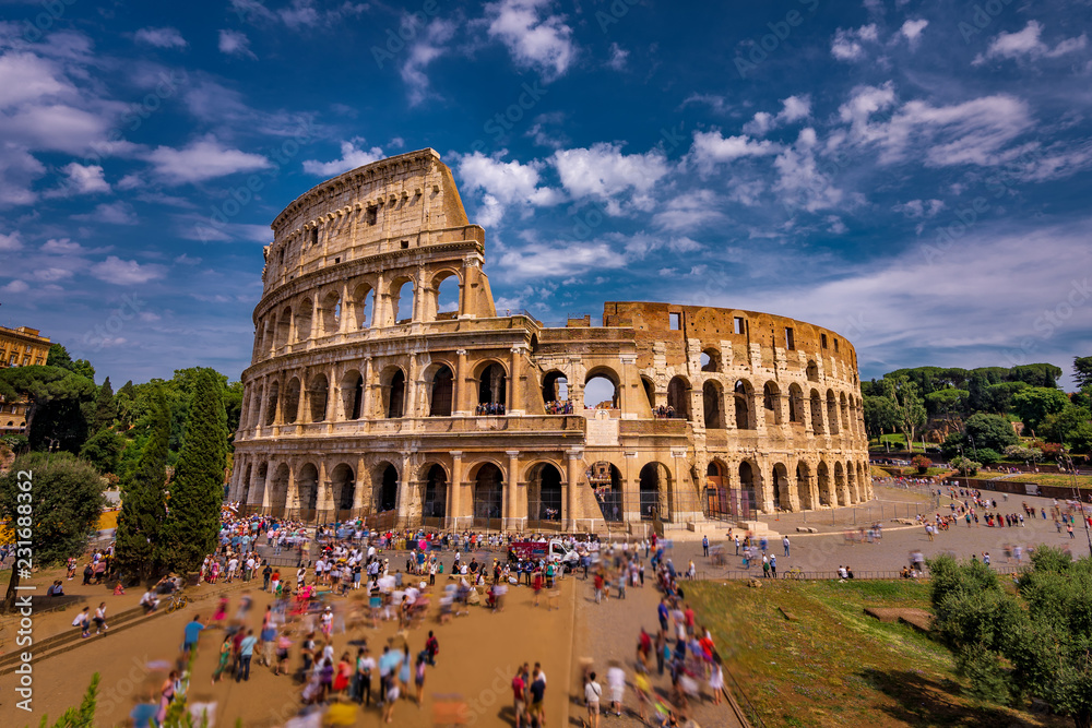 Fototapeta premium Tourists Visiting The Colosseum in Rome Italy