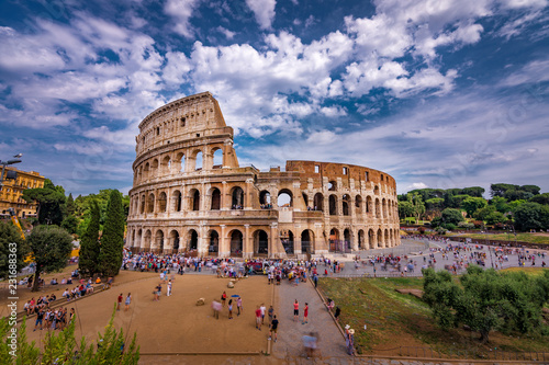 Photography Tourists Visiting The Colosseum in Rome Italy