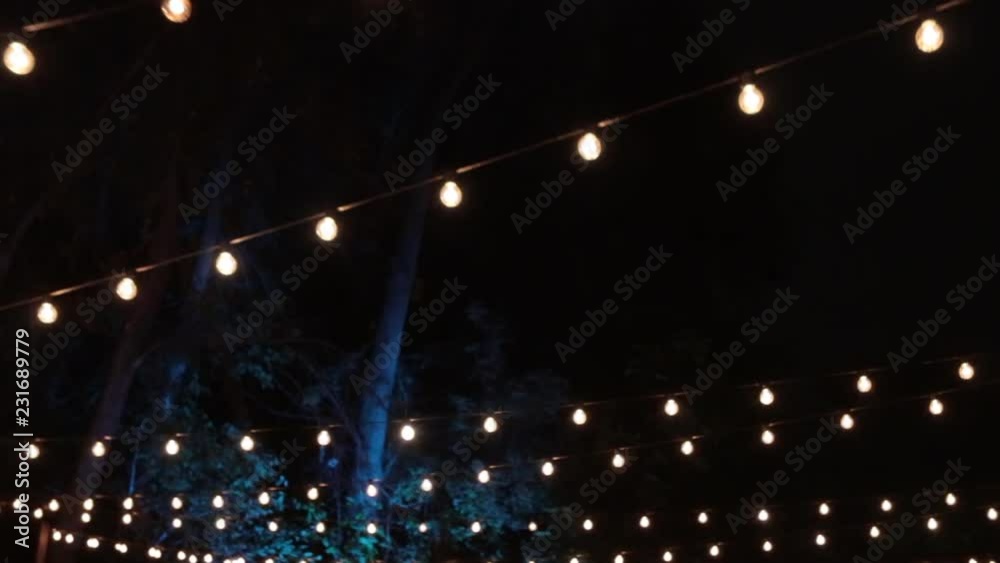 Hanging string light rows night