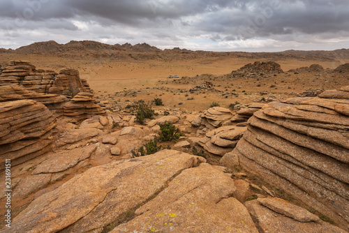 Panoramic View Baga Gazriin Chuluu, Mongolia, Rock Formations and Stacked Stones on Granite Hilltops photo