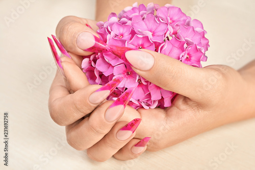 French manicure with pink flower
