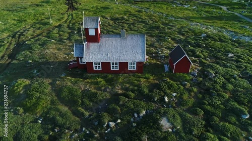 4k 60fps Greenland Aerial view rotating around church of Ilimanaq fishing village photo