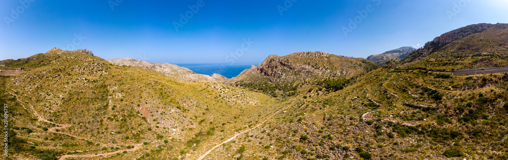 Aerial view, Spain, Balearic Islands, Mallorca, Andratx region, west coast, Tramuntana mountains, Mirador de Ricardo Roca Aerial view, Spain, Balearic Islands, Mallorca, Andratx region, west coast, Tramuntana mountains, Mirador de Ricardo Roca