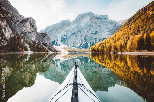 Kayak on a lake with mountains in the Alps