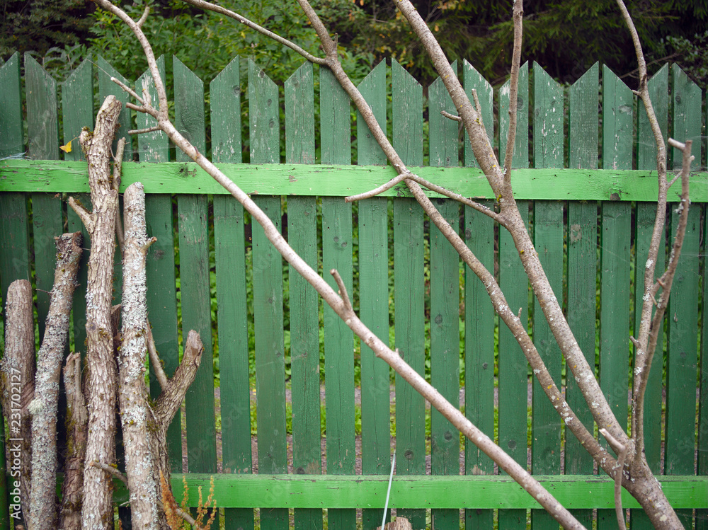 wooden fence painted in green wooden fence painted in green