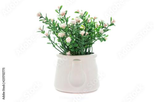 Artificial plastic flowers isolated on white background.