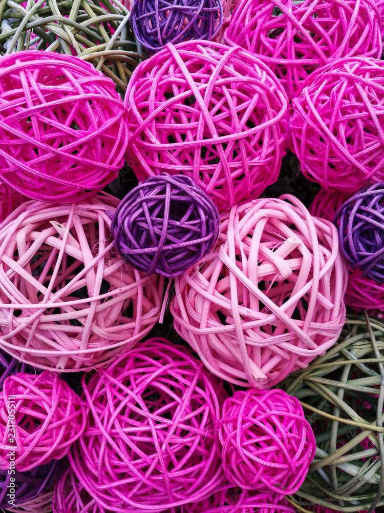 A large number of colored rattan balls