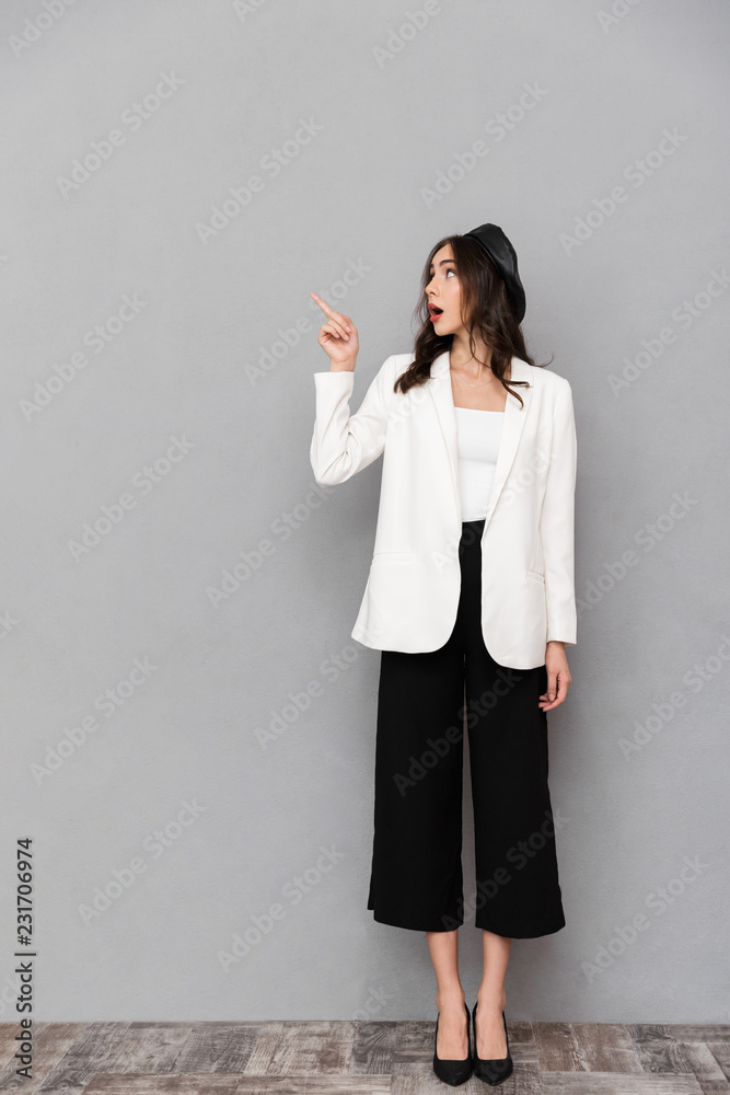 Full length portrait of a pretty young woman Full length portrait of a pretty young woman