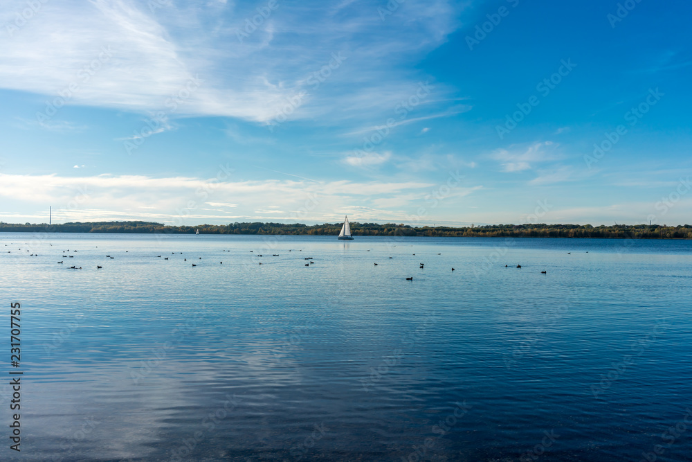 Sailing on a blue lake, Cospudener Lake in Leipzig, Germany Sailing on a blue lake, Cospudener Lake in Leipzig, Germany