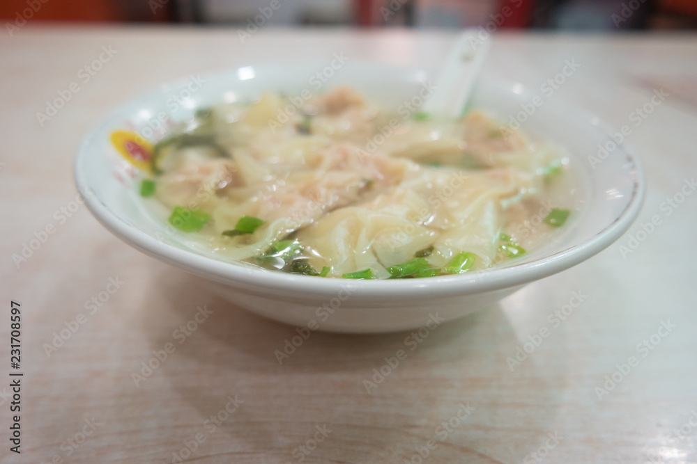 Shrimp dumplings with soup delicious, on brown napery/Asia food Shrimp dumplings with soup delicious, on brown napery/Asia food