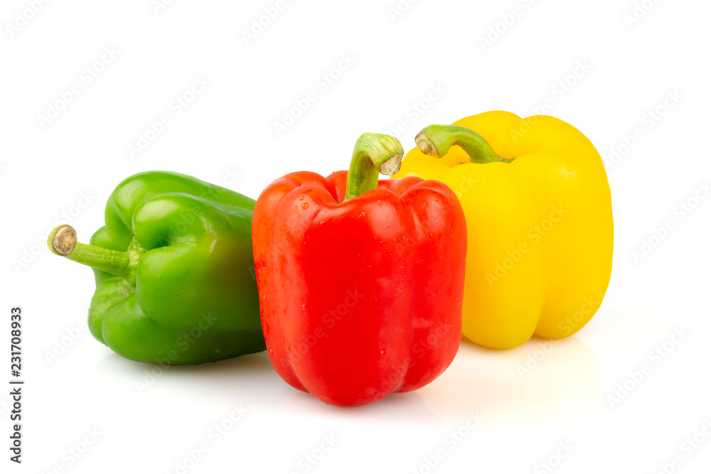 Three different colored of sweet bell peppers (capsicum) isolated on white background. Three different colored of sweet bell peppers (capsicum) isolated on white background.