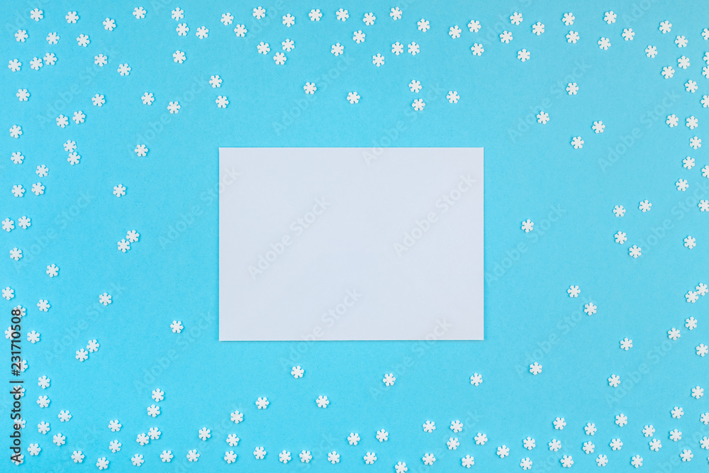Winter pattern made of small white snowflakes Winter pattern made of small white snowflakes