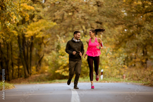 Young people jogging and ex...