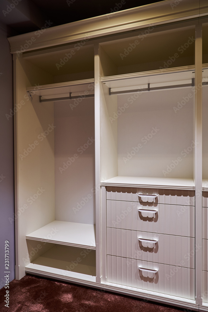 Luxury wardrobes in the dressing room in modern style Luxury wardrobes in the dressing room in modern style