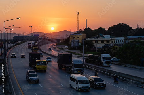 Laem Chabang Industrial Estate, Thailand, Cars on highway road on sunset time in busy city on 31 October 2018 photo