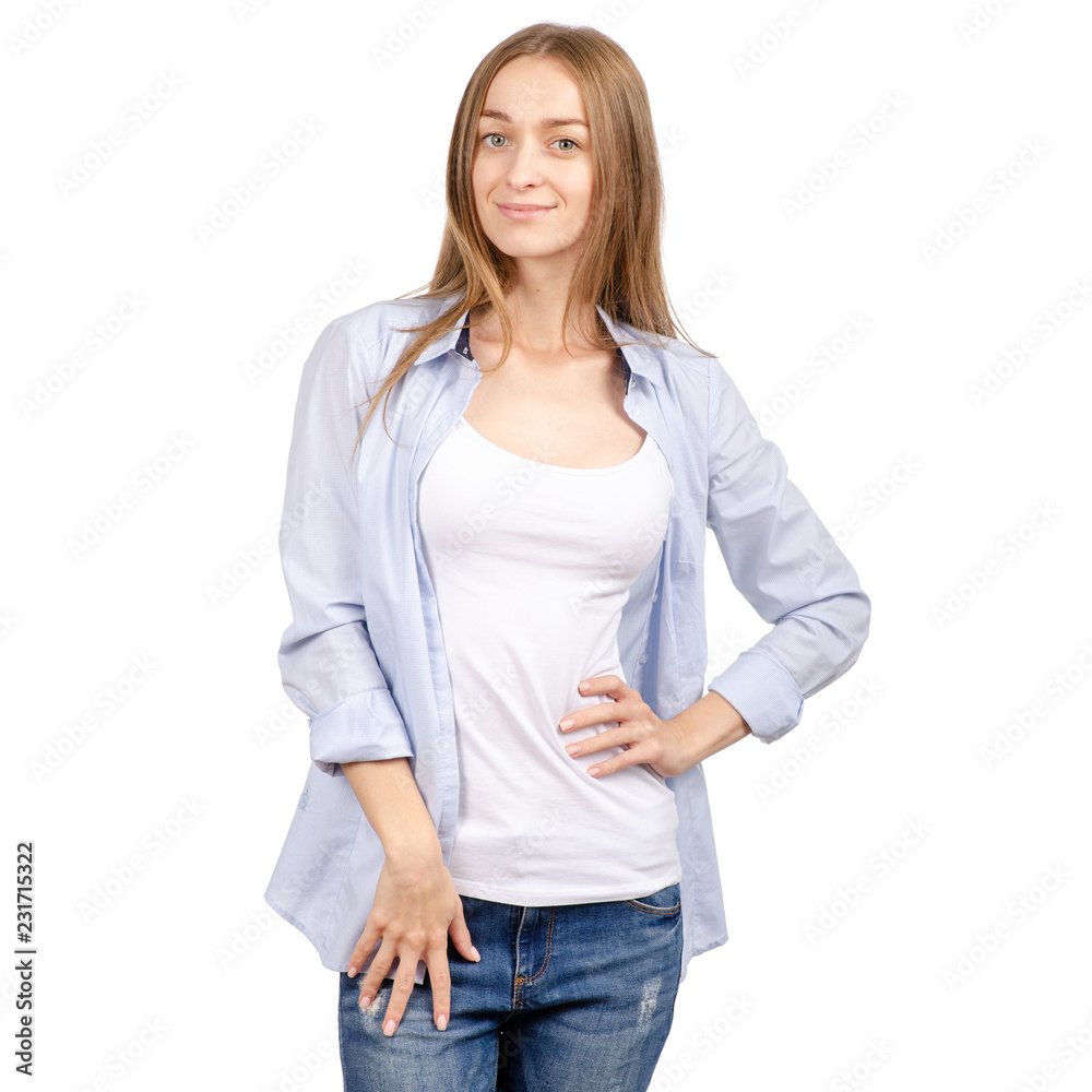 Beautiful young woman in shirt and jeans smiling on a white background. Isolation Beautiful young woman in shirt and jeans smiling on a white background. Isolation