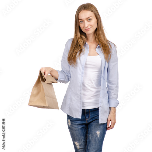 Woman holding a paper bag package shopping beauty on a white background. Isolation