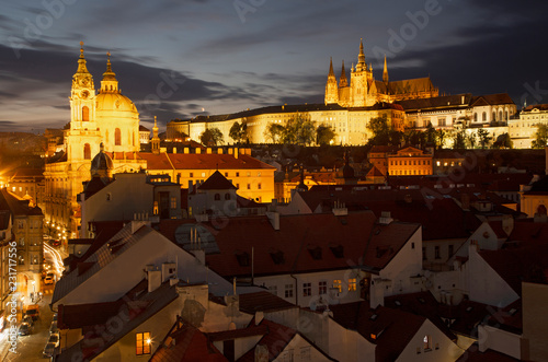 Prague - The St. Nicholas church, Mala strana, Castle and Cathedral at dusk.