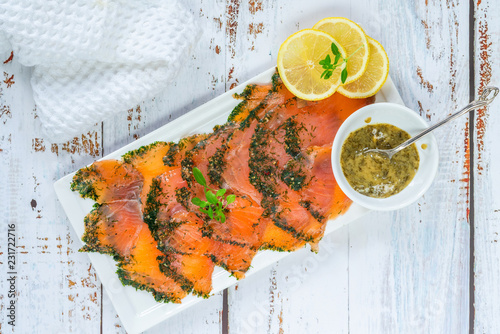 Photography Gravadlax - Nordic dish of thinly sliced raw salmon cured in salt, sugar and dil