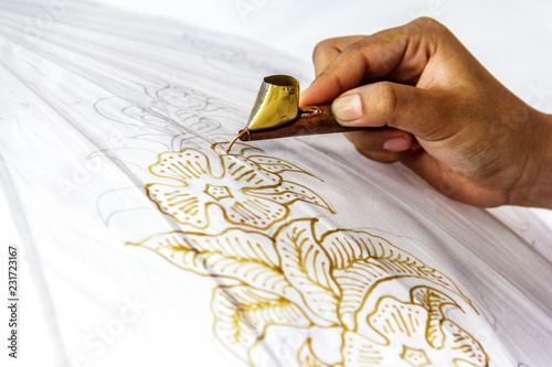 The process of making Indonesian batik with floral pattern photo