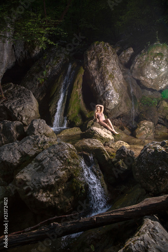 Young girl posing in swimwear at two waterfalls