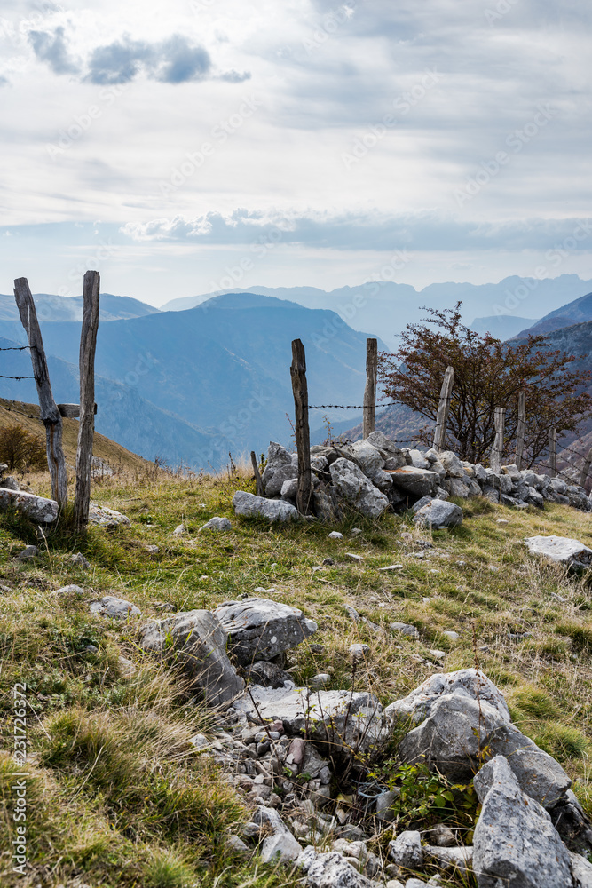 Old fence and pasture border in remote Bosnia mountains Old fence and pasture border in remote Bosnia mountains