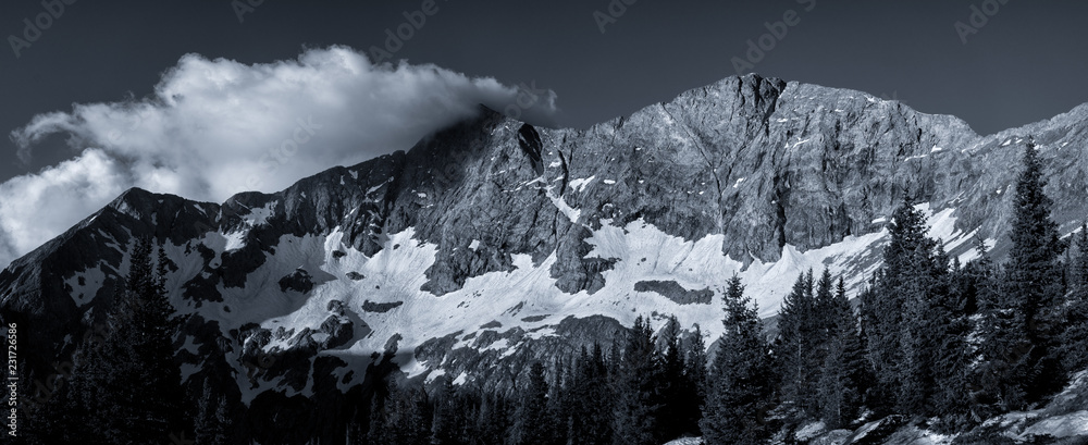 Black and white photograph of Blanca Peak, Ellingwood Point, and Little Bear Peak. Three rugged mountains in the Sangre de Cristo range of the Colorado Rocky Mountains