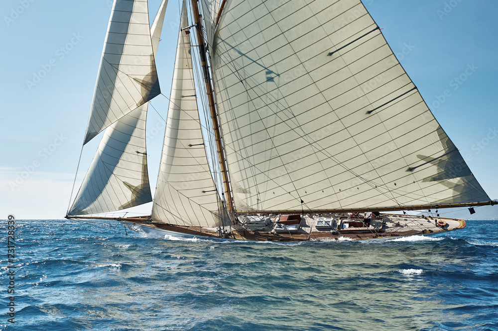 Fototapeta premium Sailing ship yacht race. Yachting. Sailing. Regatta. Classic sail yachts and sailboats