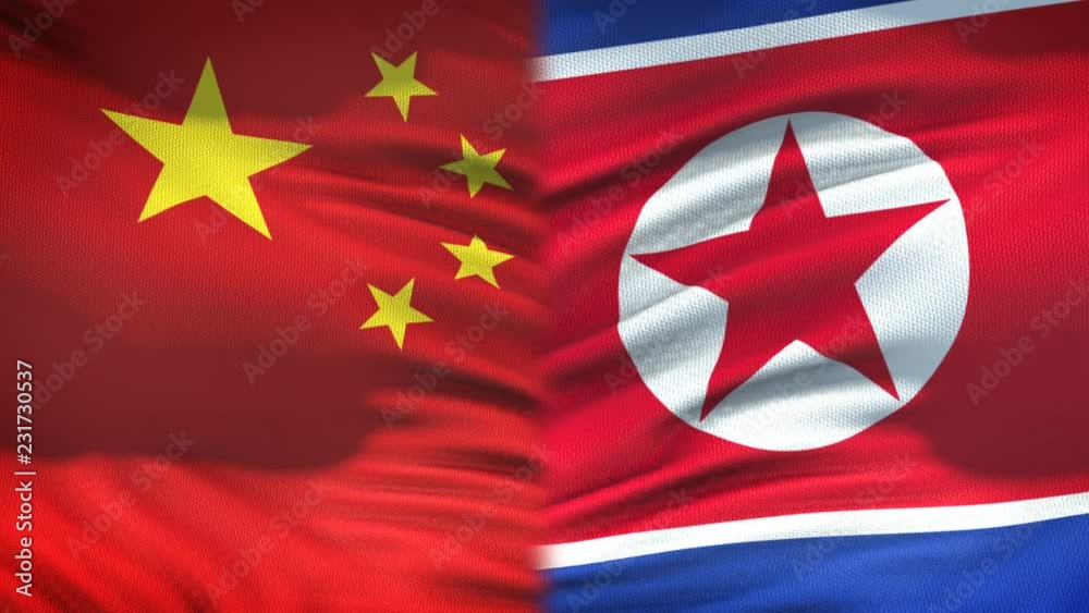 China and North Korea flags background, diplomatic and economic relations China and North Korea flags background, diplomatic and economic relations