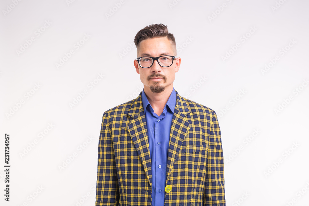 People, fashion and style concept - young stylish hipster man on white background People, fashion and style concept - young stylish hipster man on white background