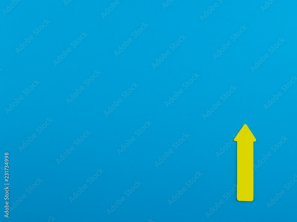 Blue background with yellow arrow sign up and copyspace for text Blue background with yellow arrow sign up and copyspace for text
