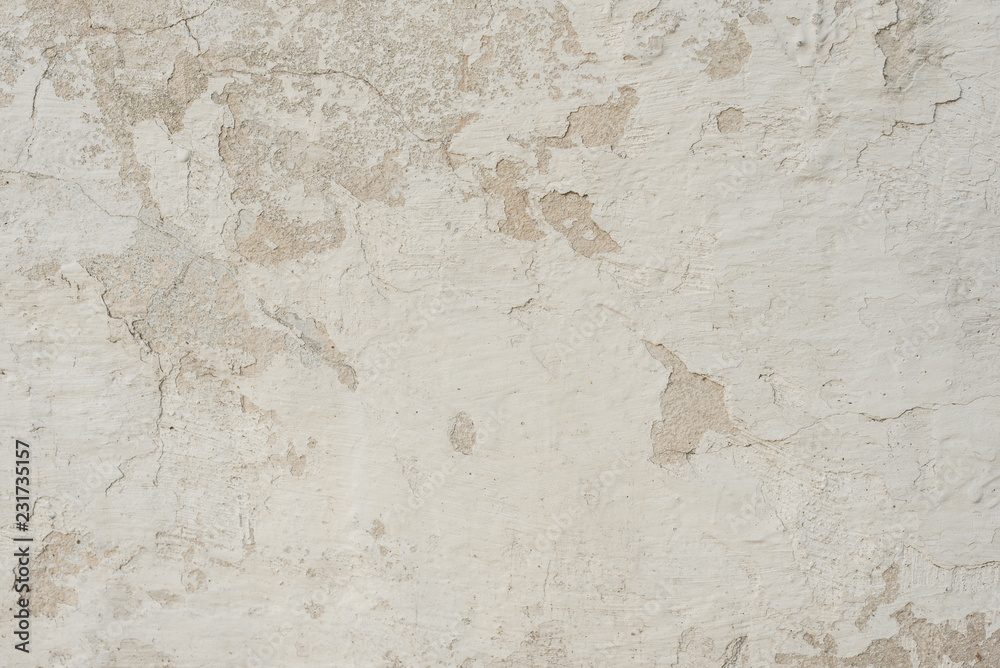 Fototapeta premium Wall fragment with scratches and cracks. It can be used as a background