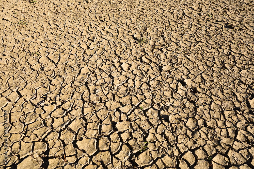 Cracked soil from lack of water Cracked soil from lack of water