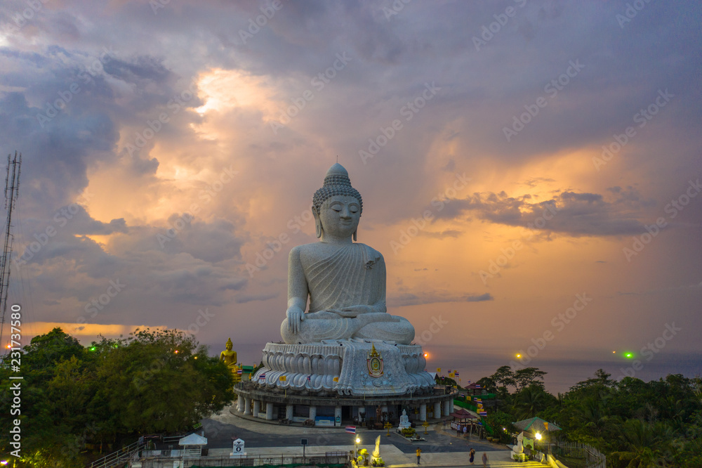 Fototapeta premium thunderstorm in sunset at Phuket big Buddha have beautiful color in the sky
