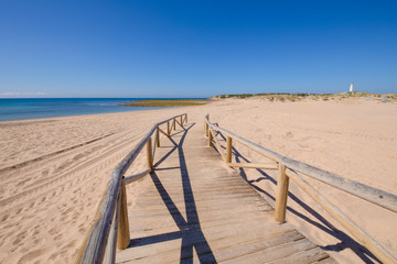 Fototapete Abstieg zum Strand Holzpfad zum Strand Canos Meca  © Q