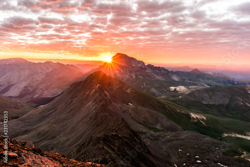 Dramatic Sunrise in the Colorado Rocky Mountains. Photo taken from the summit of Wetterhorn Peak in the San Juan Range