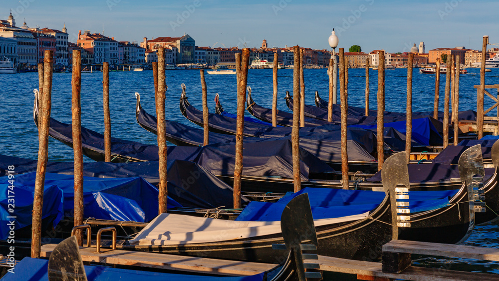 Gondolas by the Grand Canal of Venice, Italy, at dusk