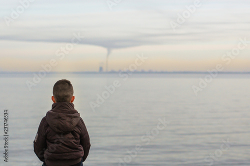 landscape on the water - sunset on the horizon line (sky and clouds). Top view.