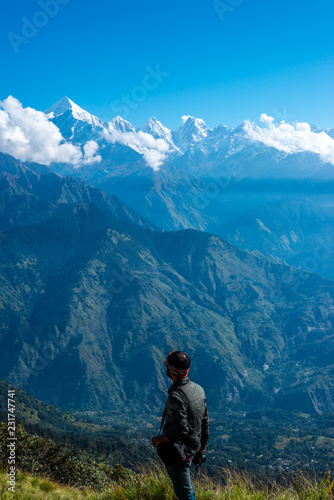 Trekker at Peak of Himalayas