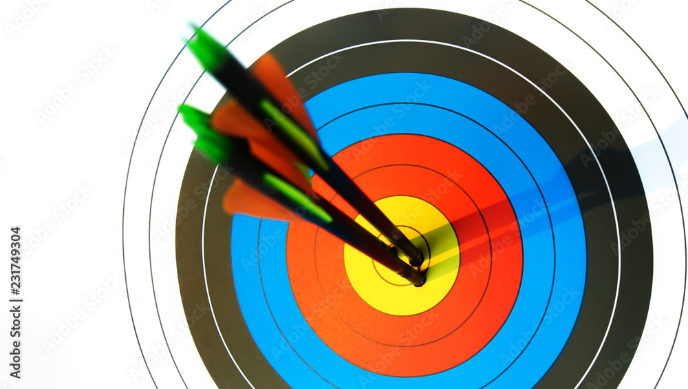 Close-up 3 Arrows ware shots in the center of crotch with copy space, Bow target in sunset light, Selective focus at center point, Background for Business target concept or Inspiration Close-up 3 Arrows ware shots in the center of crotch with copy space, Bow target in sunset light, Selective focus at center point, Background for Business target concept or Inspiration