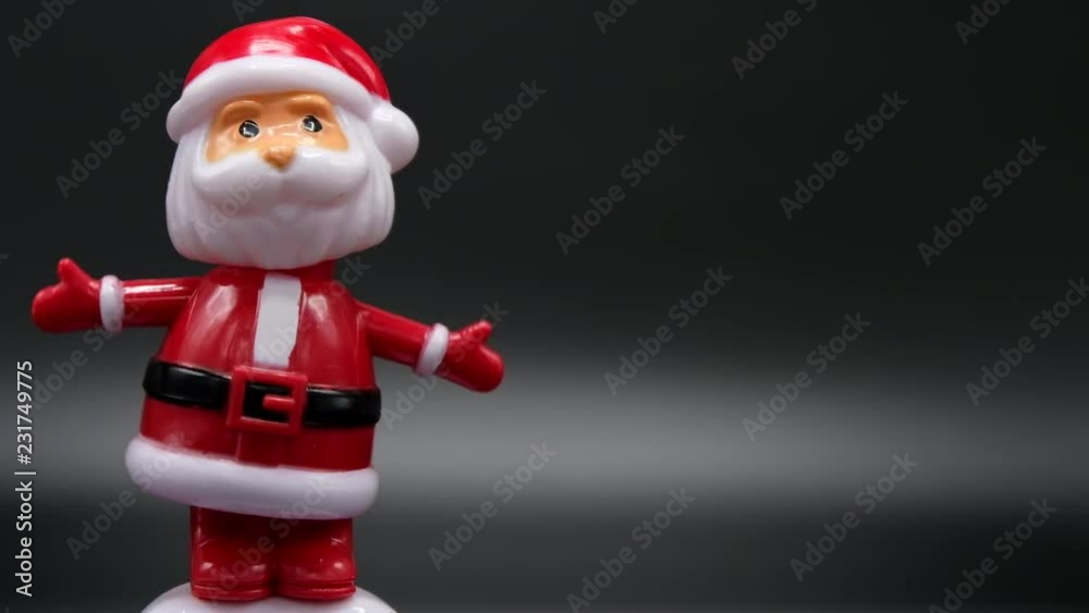 Santa Claus Merry Christmas and Happy New Year. Front, left on black. Santa Claus Merry Christmas and Happy New Year. Front, left on black.