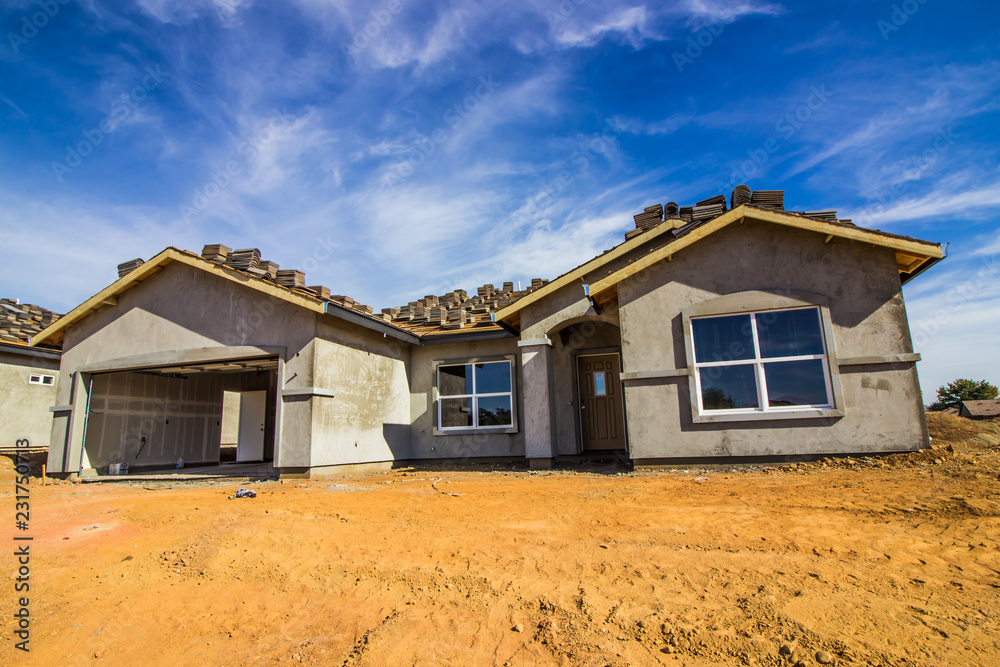 New Home Under Construction In Stucco Phase New Home Under Construction In Stucco Phase