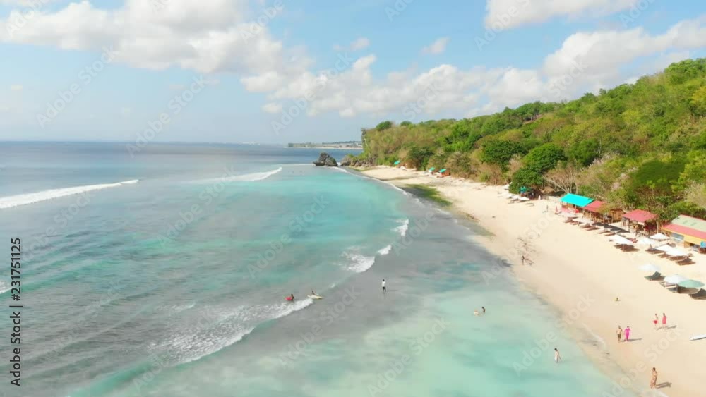Tropical beach and turquoise ocean with waves, aerial video. Tropical beach and turquoise ocean with waves, aerial video.